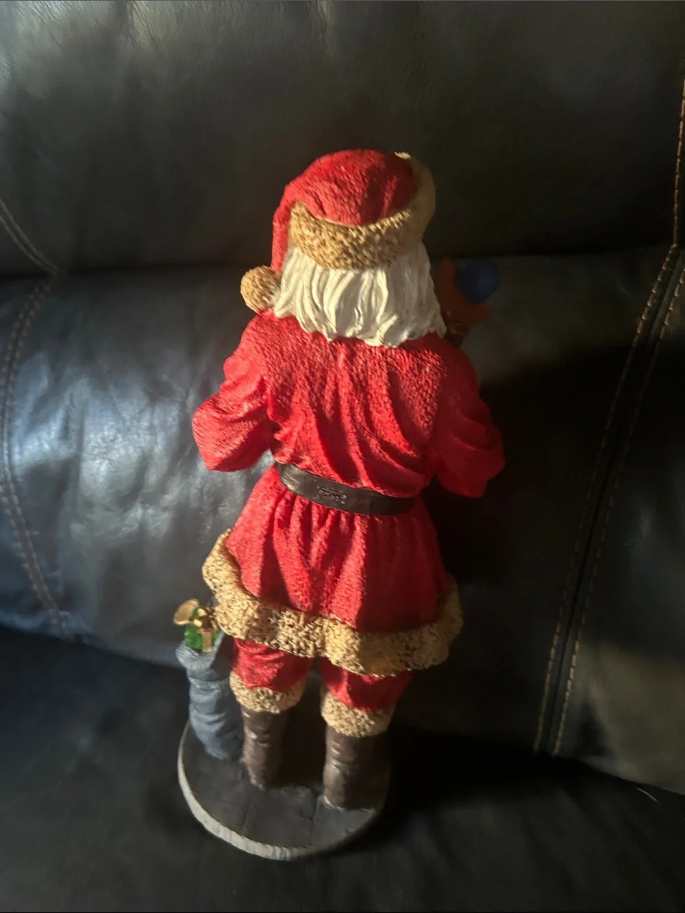 Vintage old, looking Red and Cream Santa Figurine Holding Nutcracker